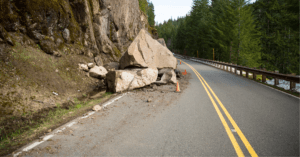 bolder falling into road