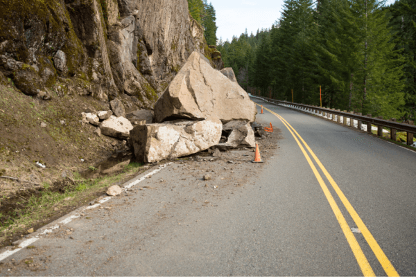 bolder falling into road